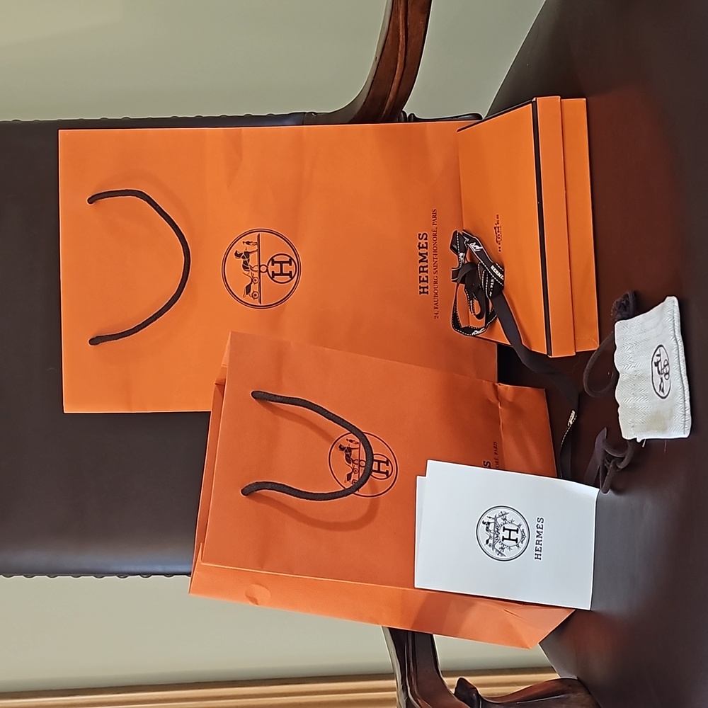 Lot of Hermes shopping bags, box and small duster bag.